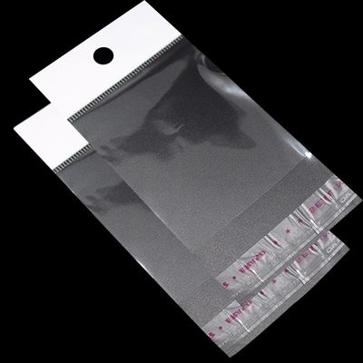 Le sachet en plastique transparent auto-adhésif d'Opp, en-tête de cadeau de papeterie de 2mil/0.05mm met en sac l'empaquetage
